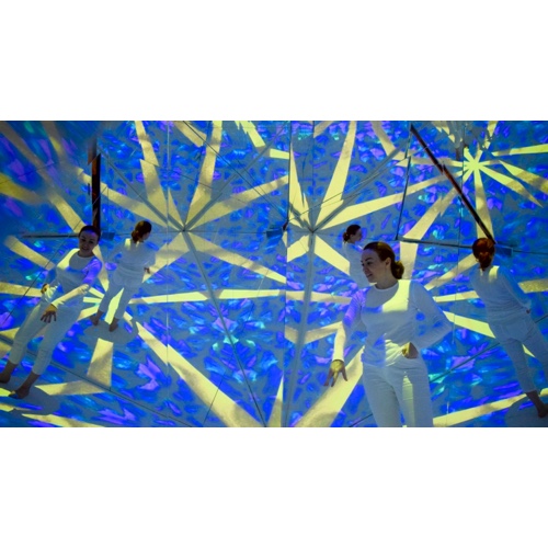 Blue and yellow kaleidoscopic interior with multimedia artist Pavlina Vagioni