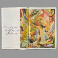 painting of colorful birds on a magazine