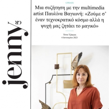 Pavlina Vagioni in front of a wall sculpture and JennyGr logo