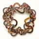 Colorful entwined snakes in a circular motif